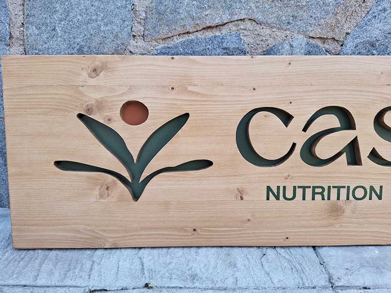 rètol de fusta troquelat